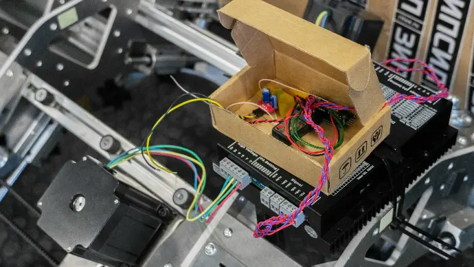A box with wires and wires inside of it